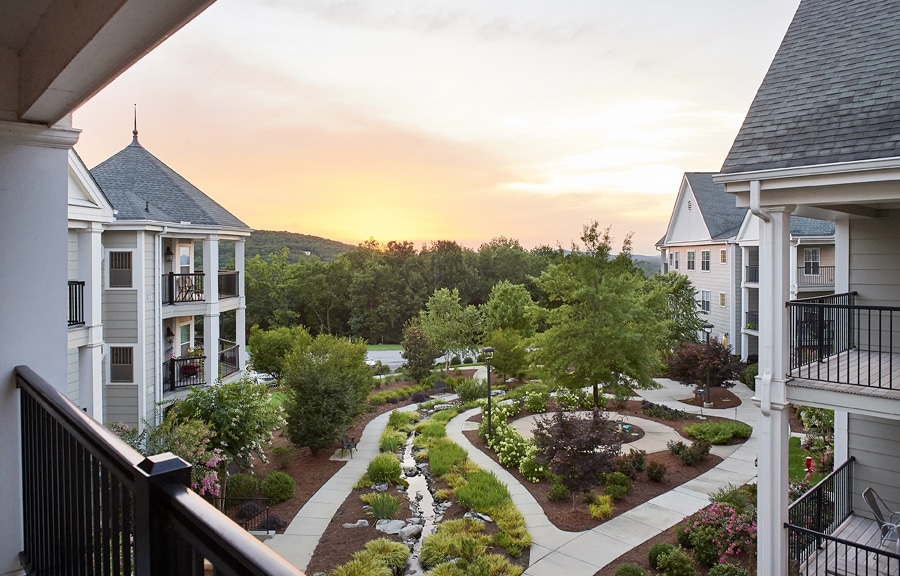 View of Redstone Village's courtyard at sunset